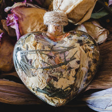 Load image into Gallery viewer, Large glass heart filled with dried areca palm, white rose petals, chrysanthemum buds, baby&#39;s breath and orange lily.
