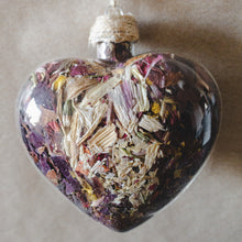 Load image into Gallery viewer, Large (3.5&quot; wide x 4&quot; tall) glass heart filled with red rose petals, pink carnation petals, orange and white lilies.
